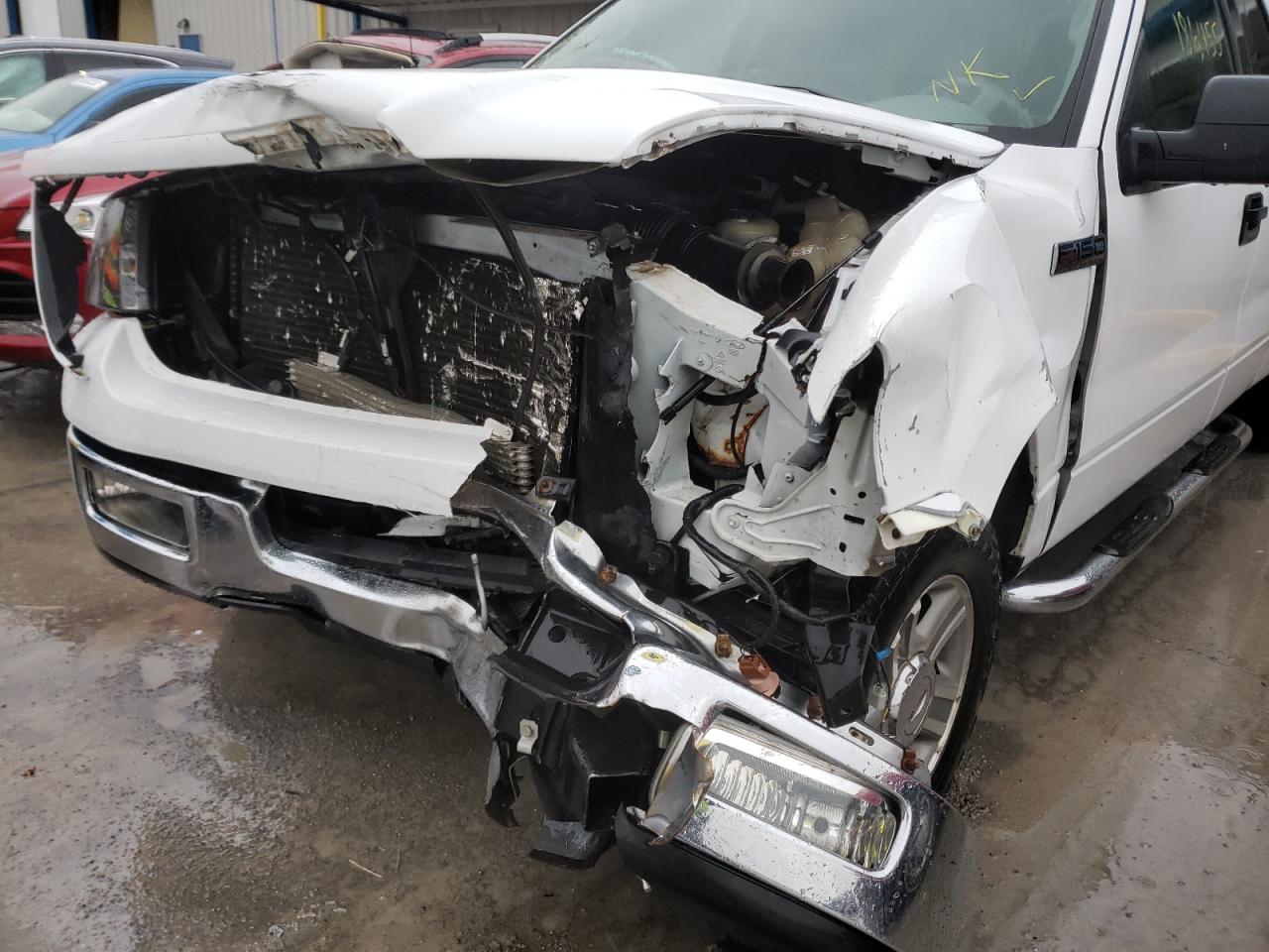 Photo 9 from auction – 2005 FORD F150 with VIN 1FTPX12575FB70241
