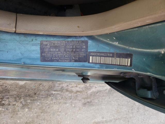 Photo 9 from auction – 2004 KIA RIO CINCO with VIN KNADC165946227656