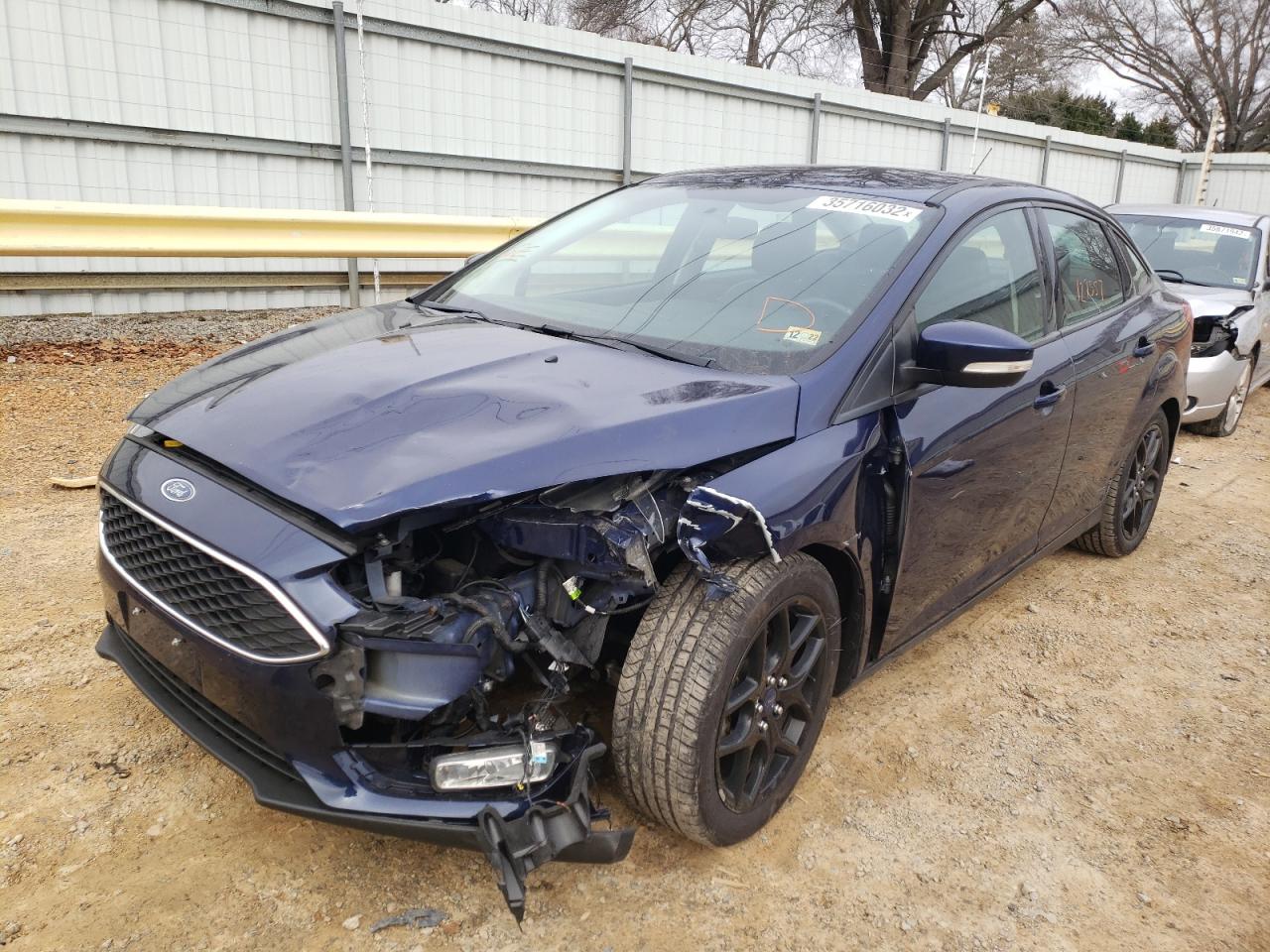 Photo 2 from auction – 2016 FORD FOCUS SE with VIN 1FADP3F23GL357422