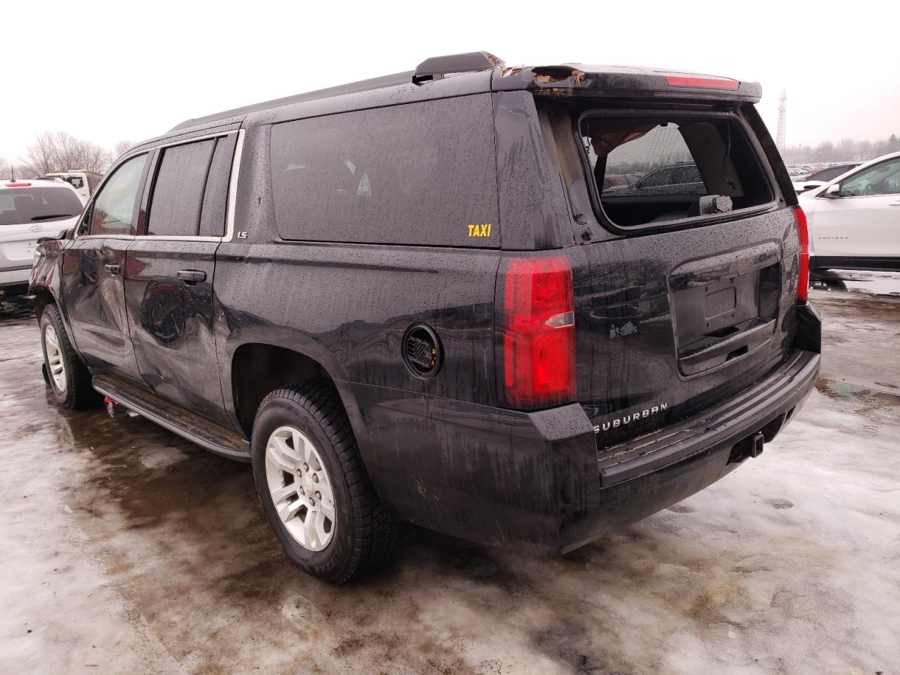 Photo 3 from auction – 2015 CHEVROLET SUBURBAN K with VIN 1GNSKHKC2FR140359