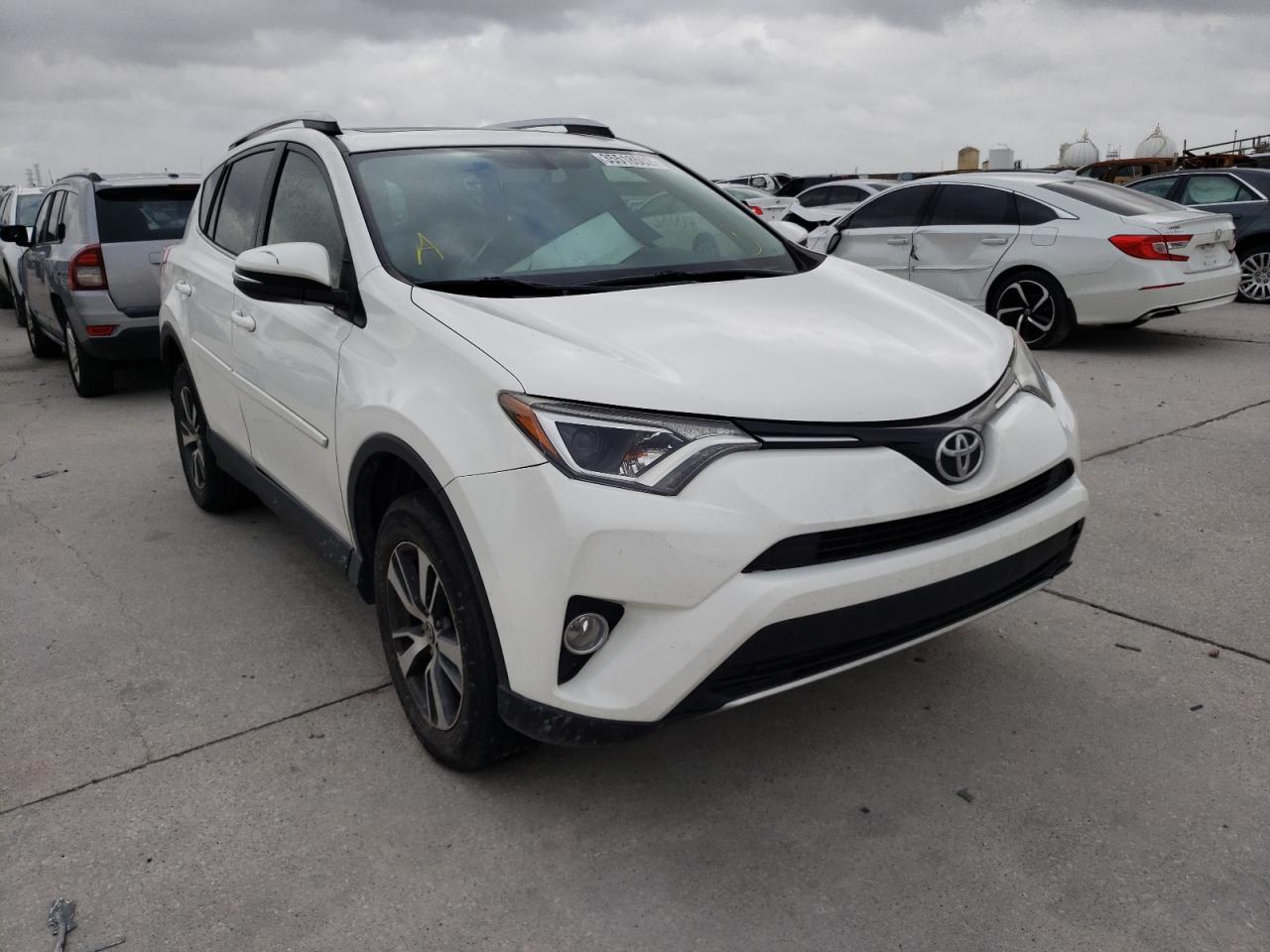 Photo 1 from auction – 2016 TOYOTA RAV4 XLE with VIN JTMWFREV8GJ060260