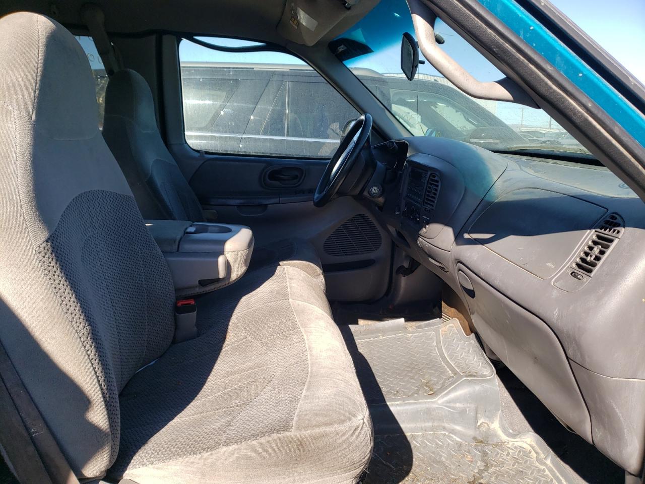 Photo 5 from auction – 1999 FORD F150 with VIN 1FTRX18L2XKA11510