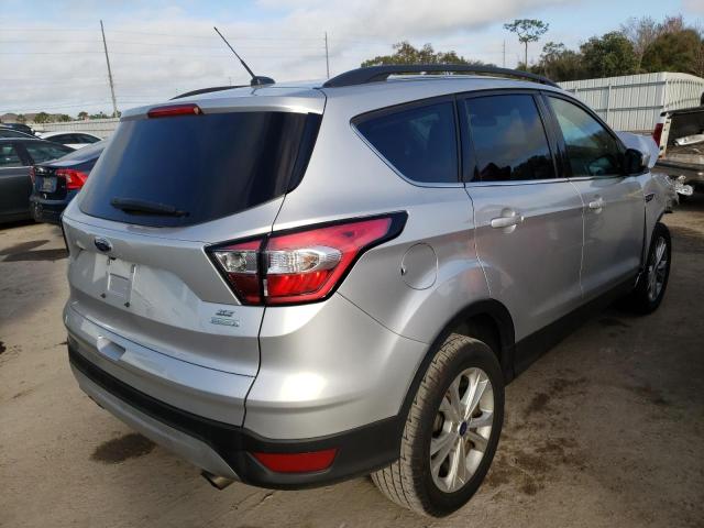 Foto 4 de la subasta – 2017 FORD ESCAPE SE con VIN 1FMCU0GD3HUC98554