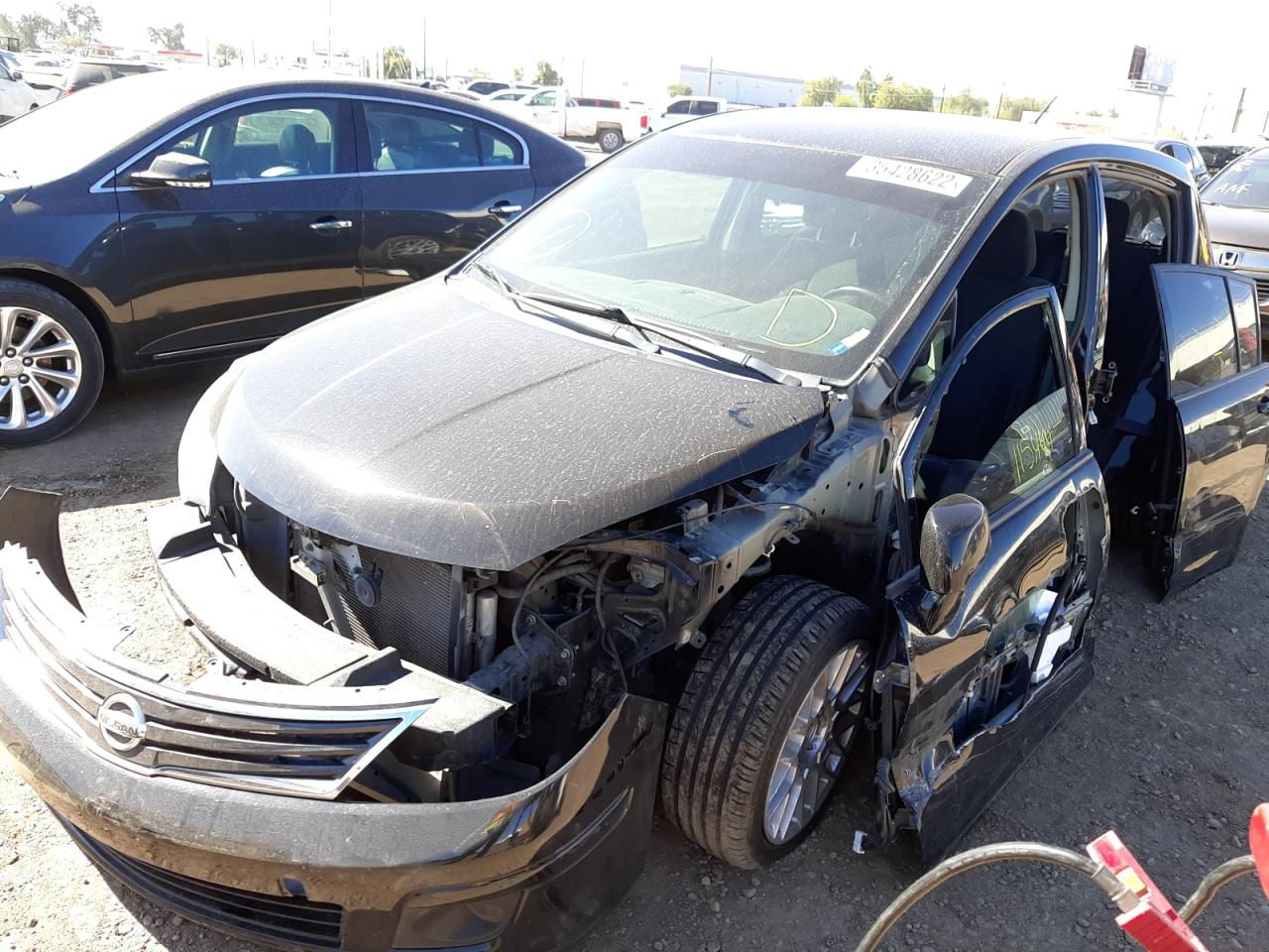 Photo 9 from auction – 2012 NISSAN VERSA S with VIN 3N1BC1CP3CK211336