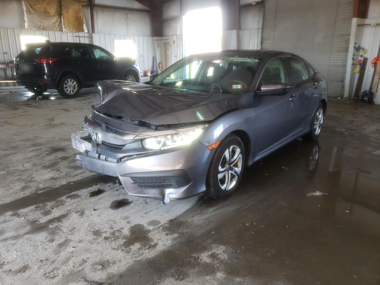 Photo 2 from auction – 2017 HONDA CIVIC LX with VIN 19XFC2F50HE053722