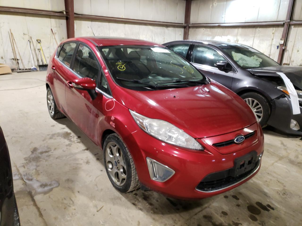 FORD FIESTA SES 2011 with VIN 3FADP4FJ9BM232588 - Photo from auction