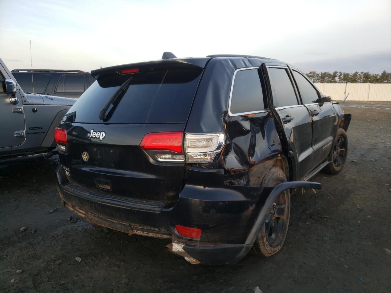 Photo 4 from auction – 2014 JEEP GRAND CHER with VIN 1C4RJFAG0EC304910