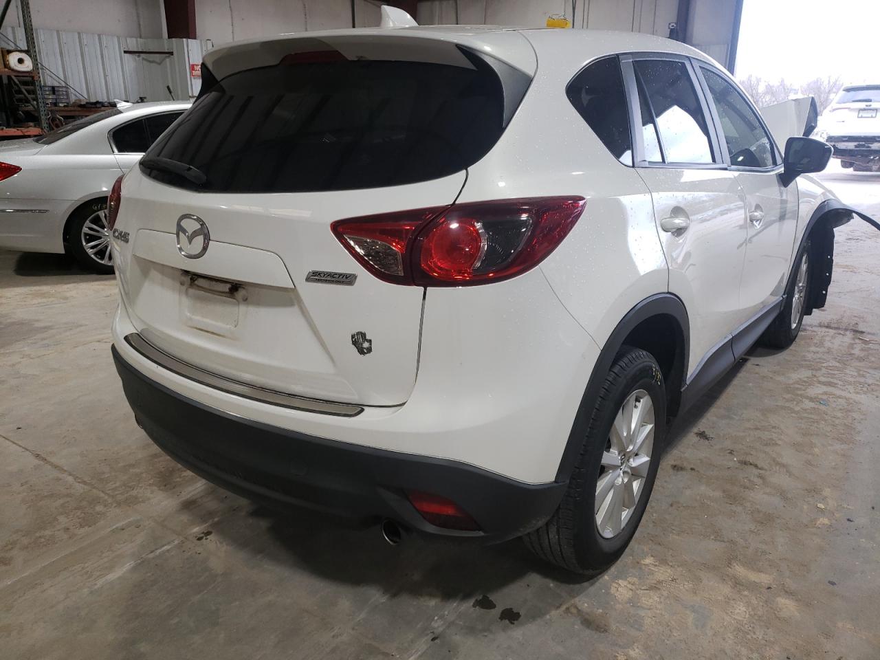 Photo 4 from auction – 2013 MAZDA CX-5 TOURI with VIN JM3KE2CE0D0125414
