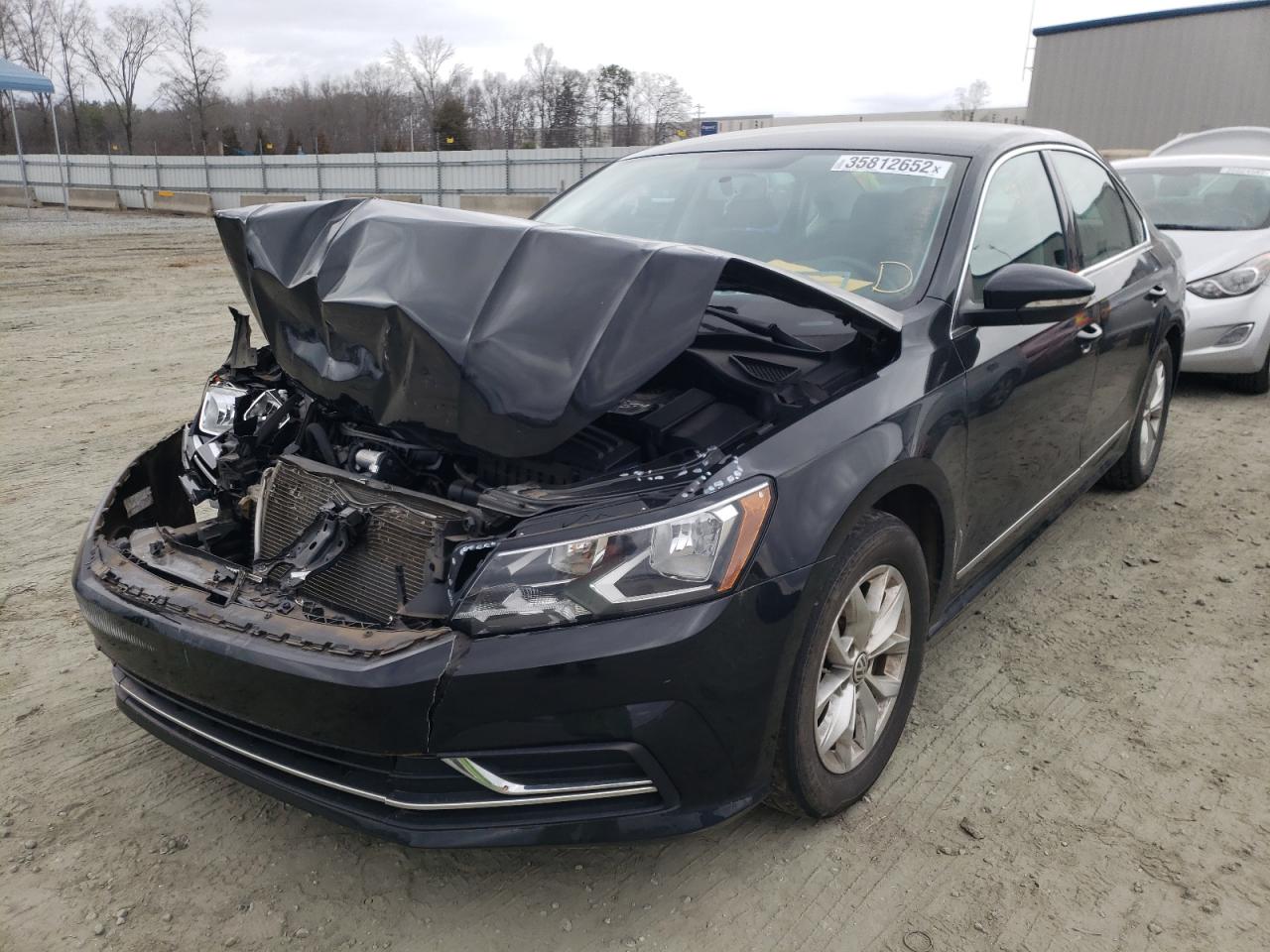 Photo 2 from auction – 2016 VOLKSWAGEN PASSAT S with VIN 1VWAS7A30GC024692