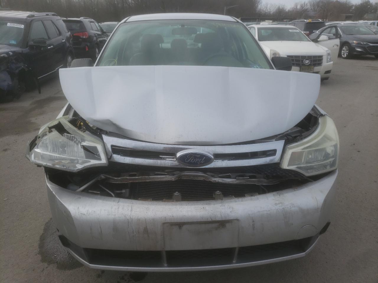 Photo 7 from auction – 2009 FORD FOCUS S with VIN 1FAHP34N69W211998