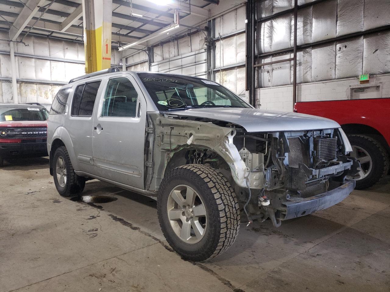 NISSAN PATHFINDER 2010 with VIN 5N1AR1NB7AC610628 - Photo from auction