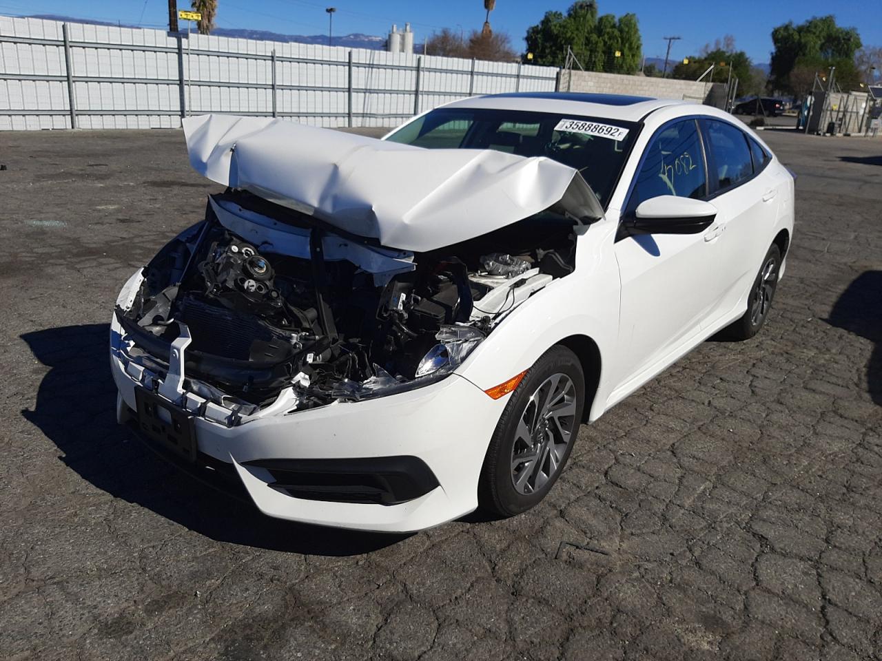Photo 2 from auction – 2018 HONDA CIVIC EX with VIN 19XFC2F76JE207020