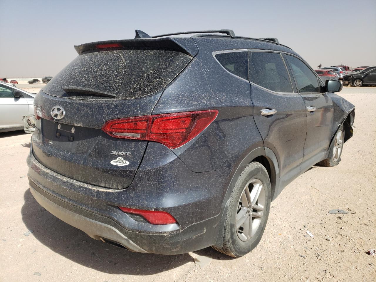 Photo 4 from auction – 2017 HYUNDAI SANTA FE S with VIN 5NMZU3LB2HH045107