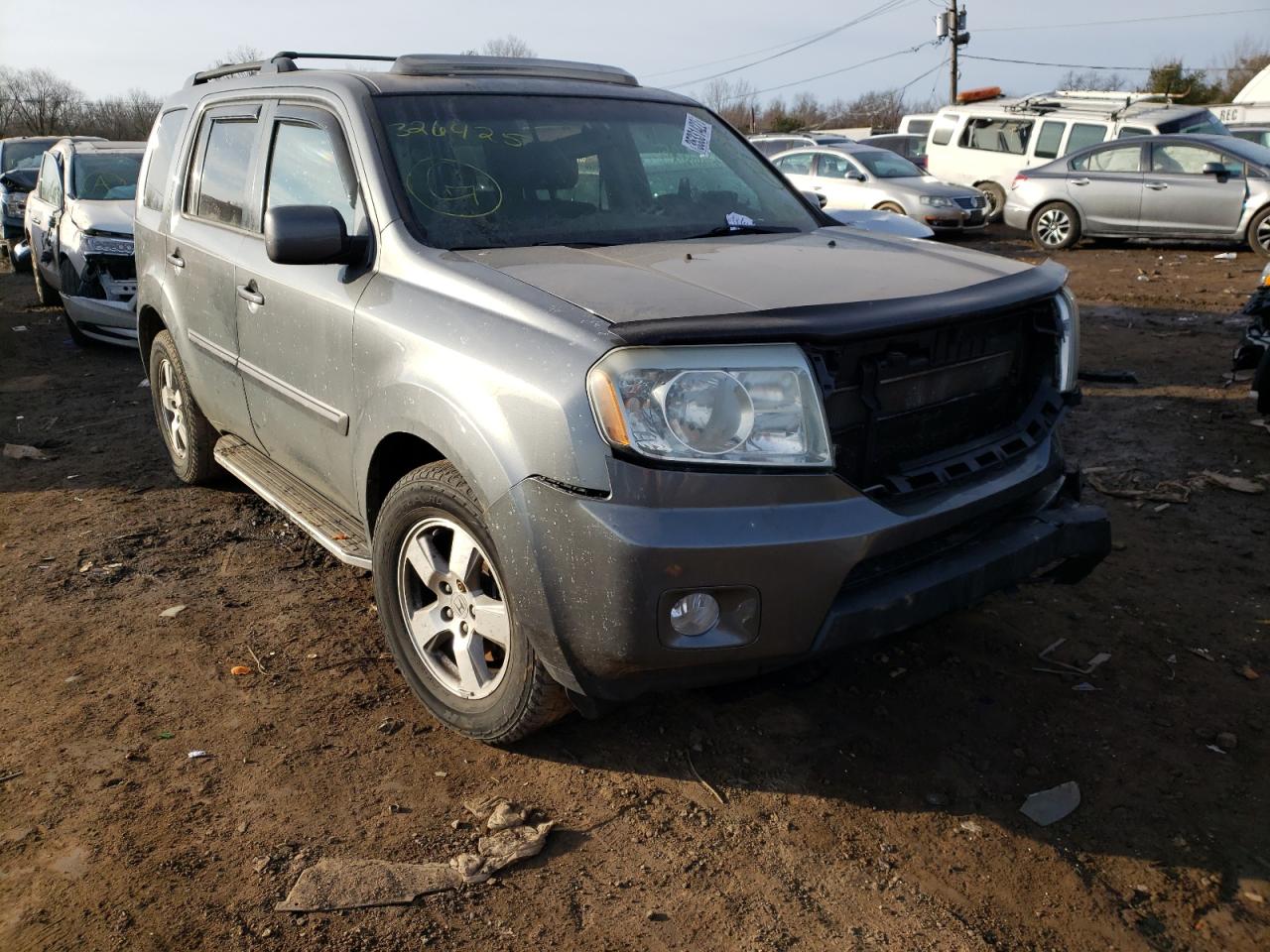 HONDA PILOT EXL 2011 with VIN 5FNYF4H53BB024502 - Photo from auction