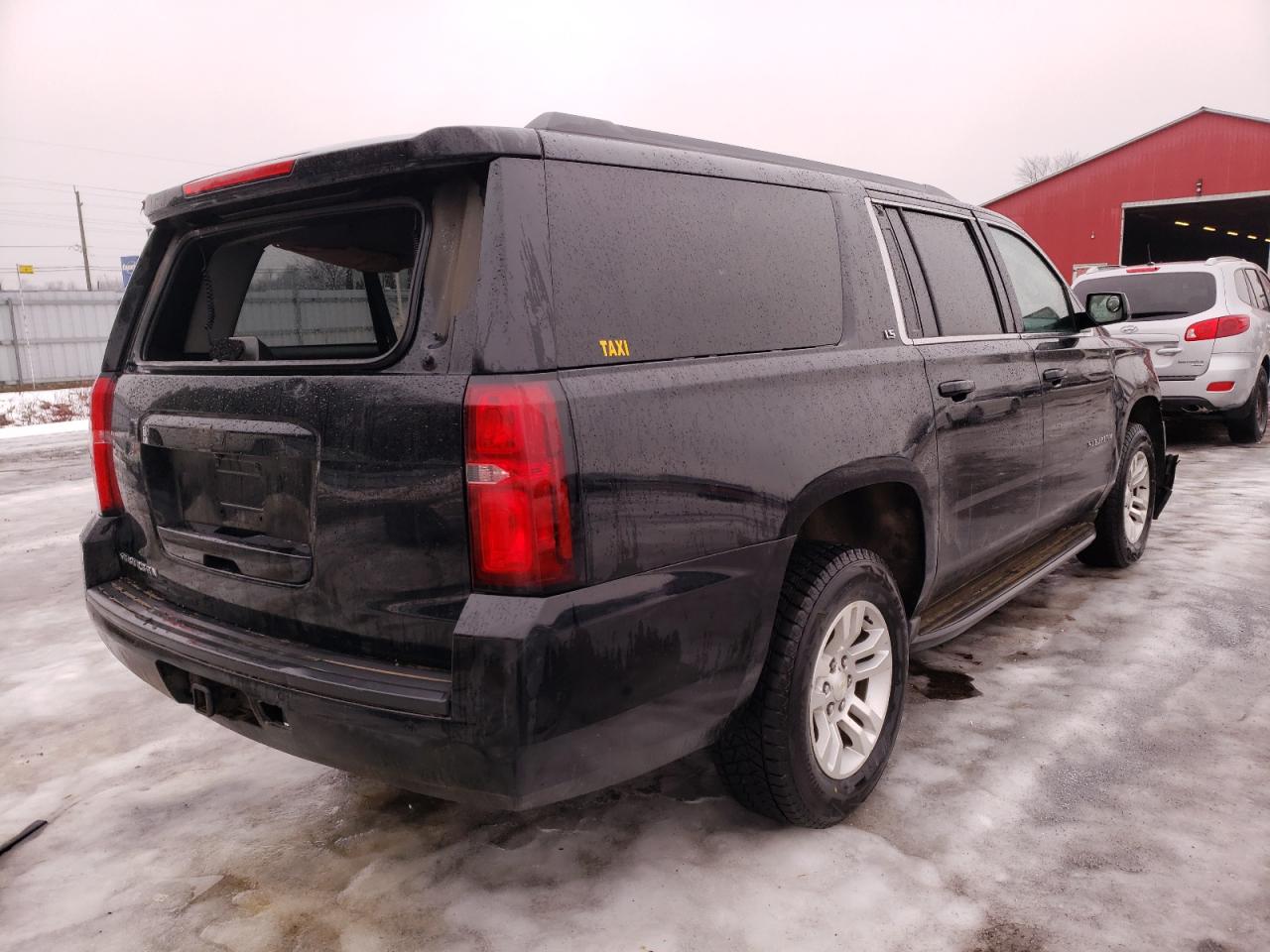 Photo 4 from auction – 2015 CHEVROLET SUBURBAN K with VIN 1GNSKHKC2FR140359