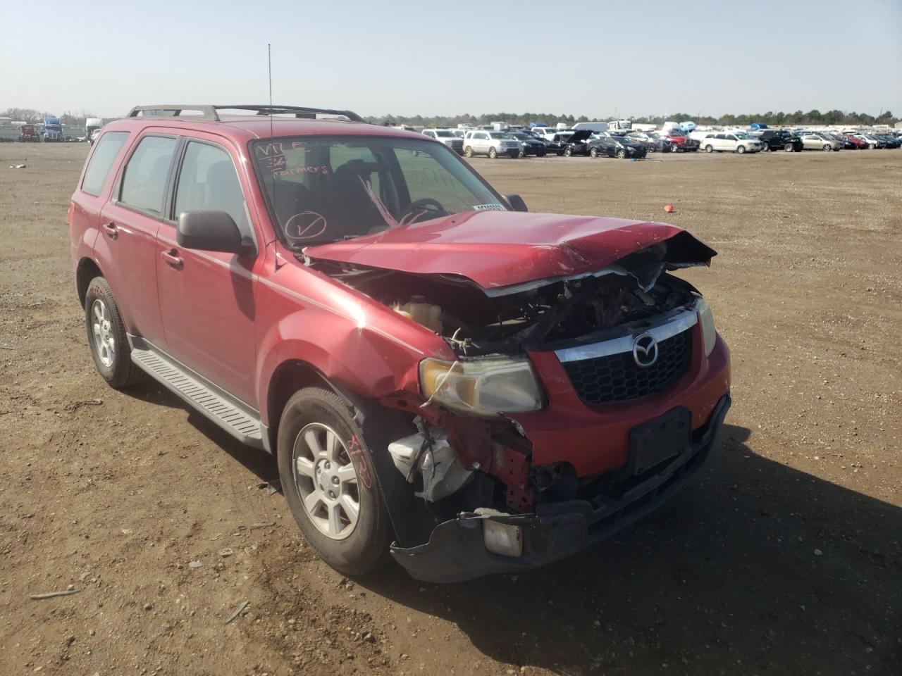 MAZDA TRIBUTE I 2011 with VIN 4F2CY0C7XBKM00069 - Photo from auction
