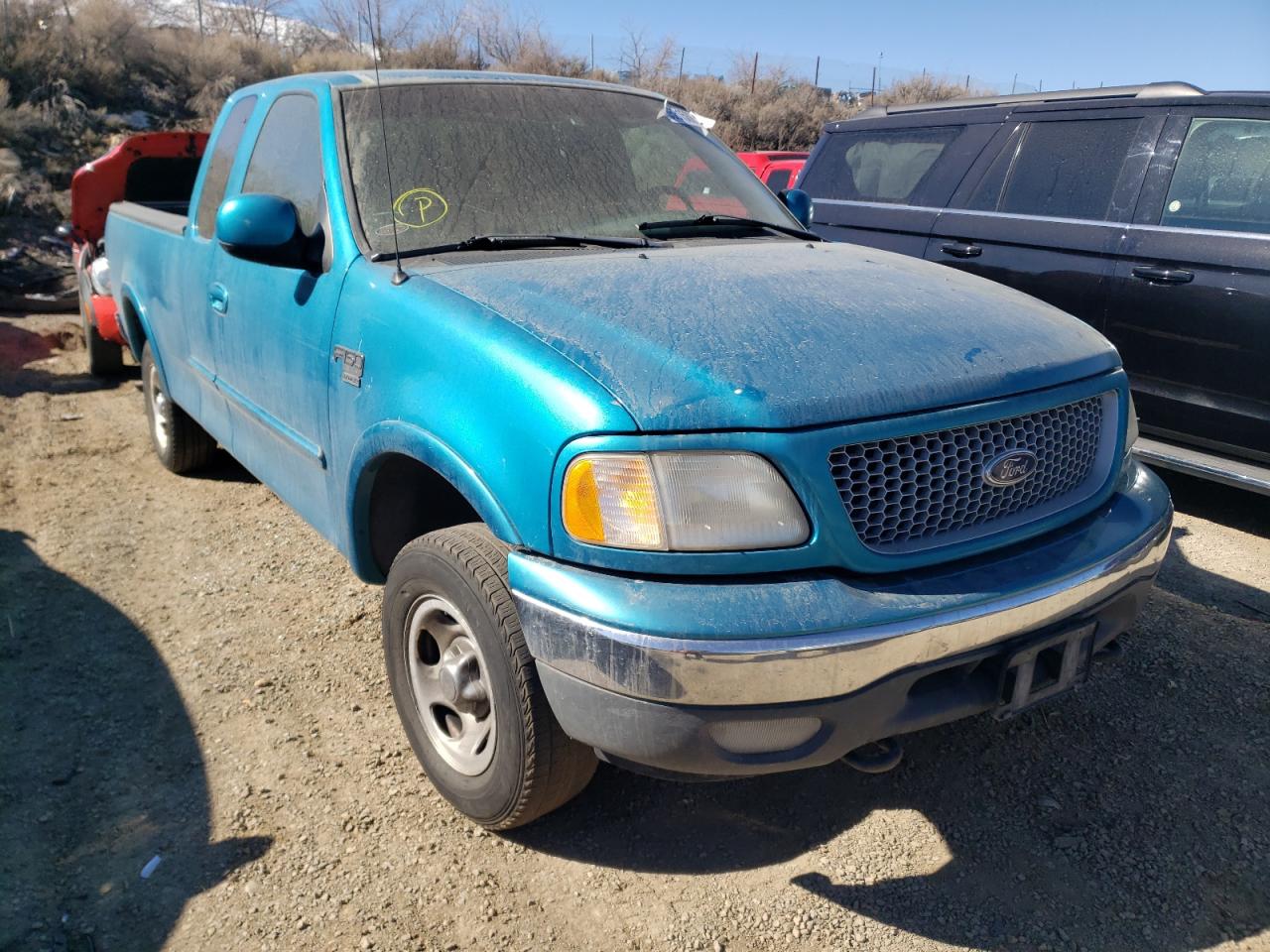 FORD F150 1999 with VIN 1FTRX18L2XKA11510 - Photo from auction