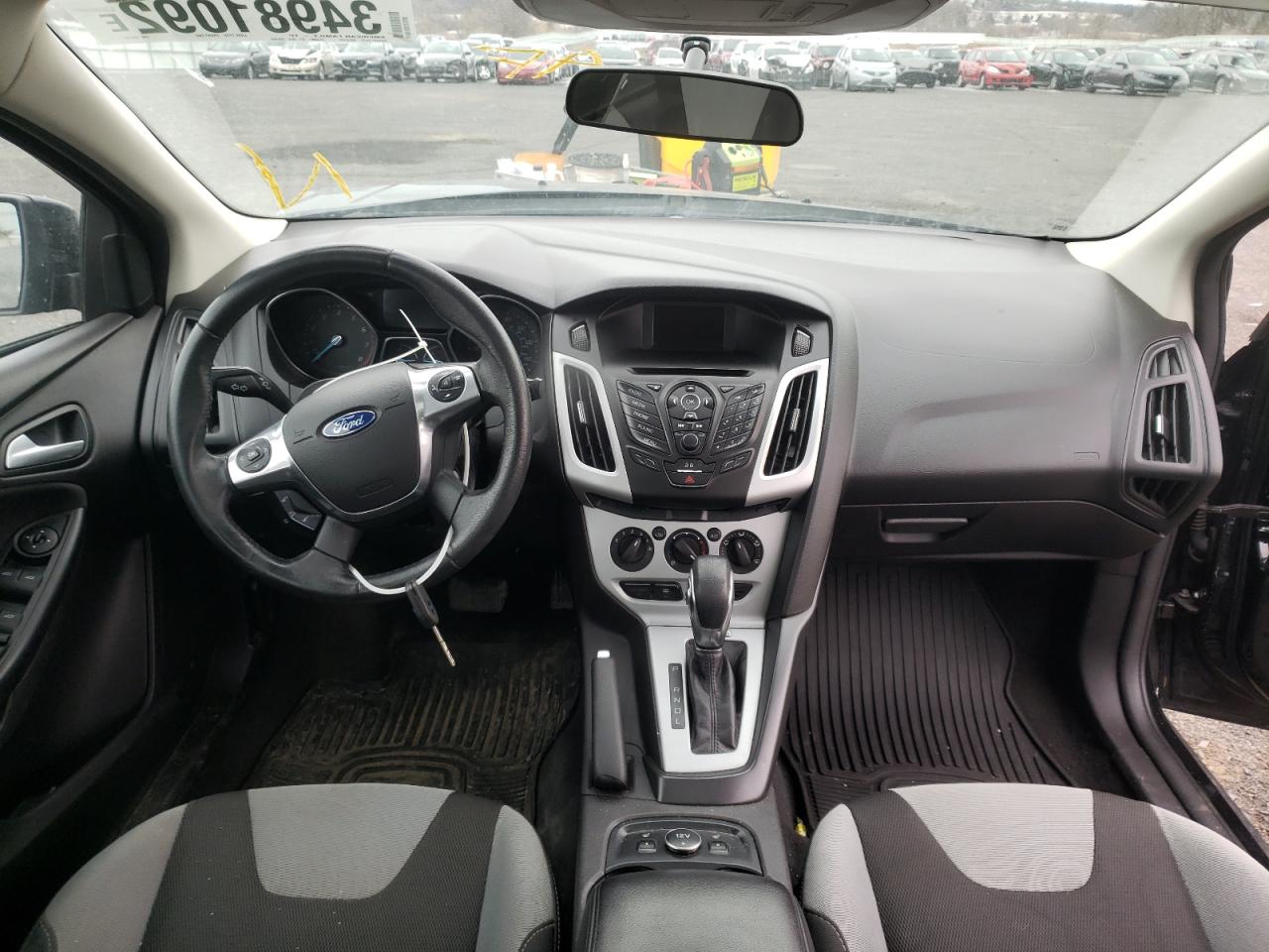 Photo 9 from auction – 2014 FORD FOCUS SE with VIN 1FADP3F22EL346585