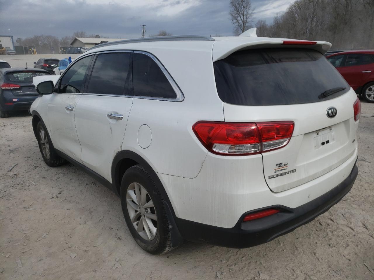 Photo 3 from auction – 2016 KIA SORENTO LX with VIN 5XYPG4A33GG053385