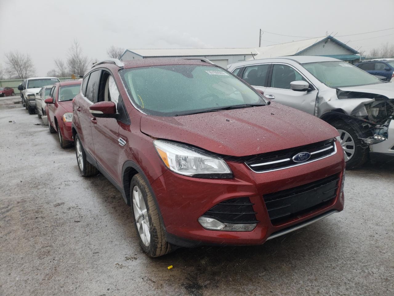 FORD ESCAPE TIT 2016 with VIN 1FMCU9J98GUB84458 - Photo from auction