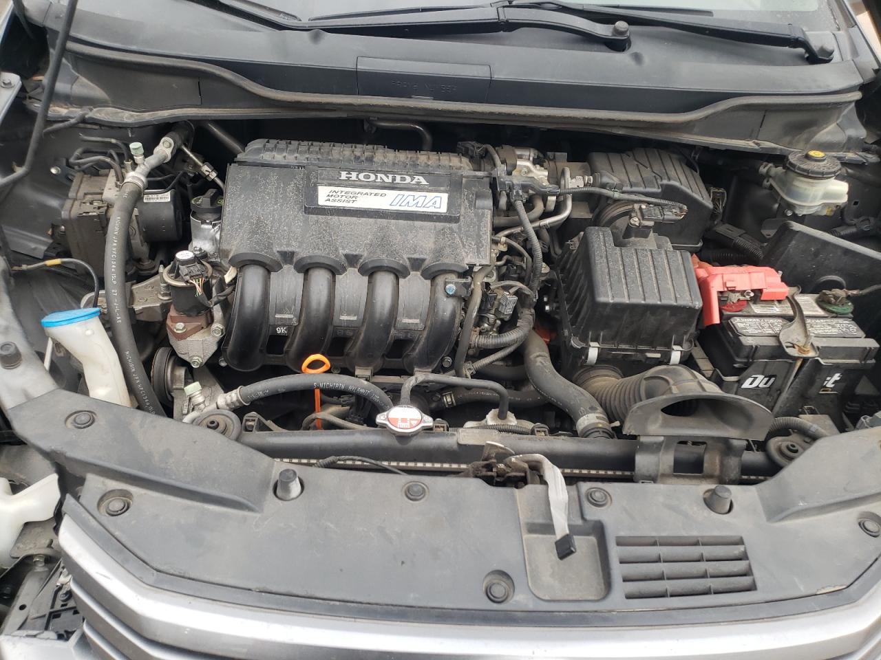 Photo 7 from auction – 2010 HONDA INSIGHT EX with VIN JHMZE2H78AS025903