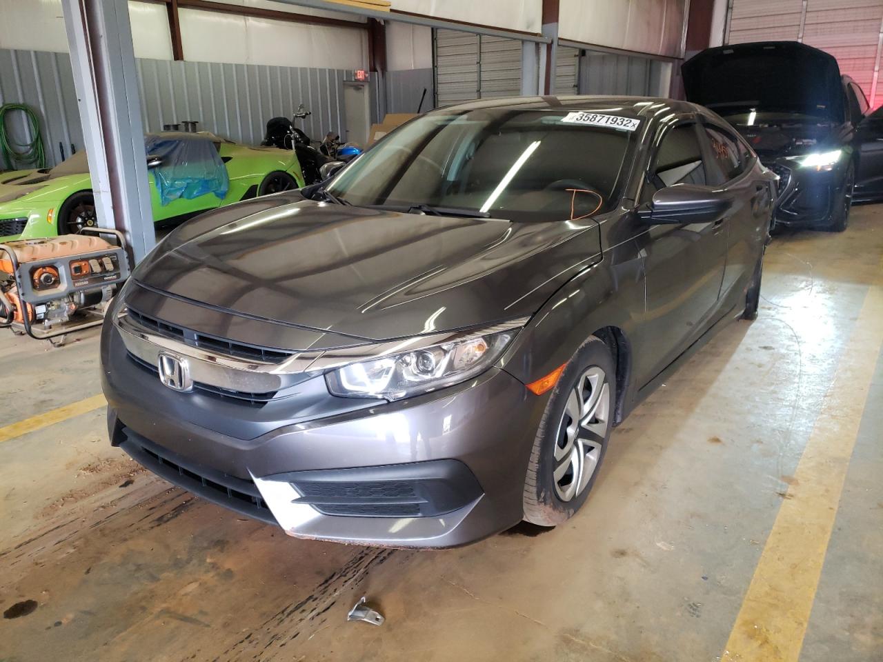 Photo 2 from auction – 2018 HONDA CIVIC LX with VIN 2HGFC2F52JH565929