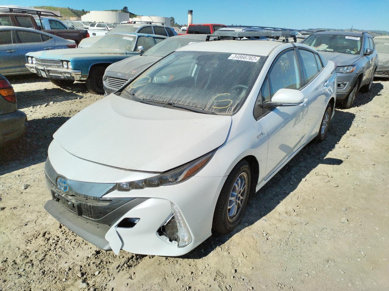 Photo 2 from auction – 2022 TOYOTA PRIUS PRIM with VIN JTDKAMFP3N3203133