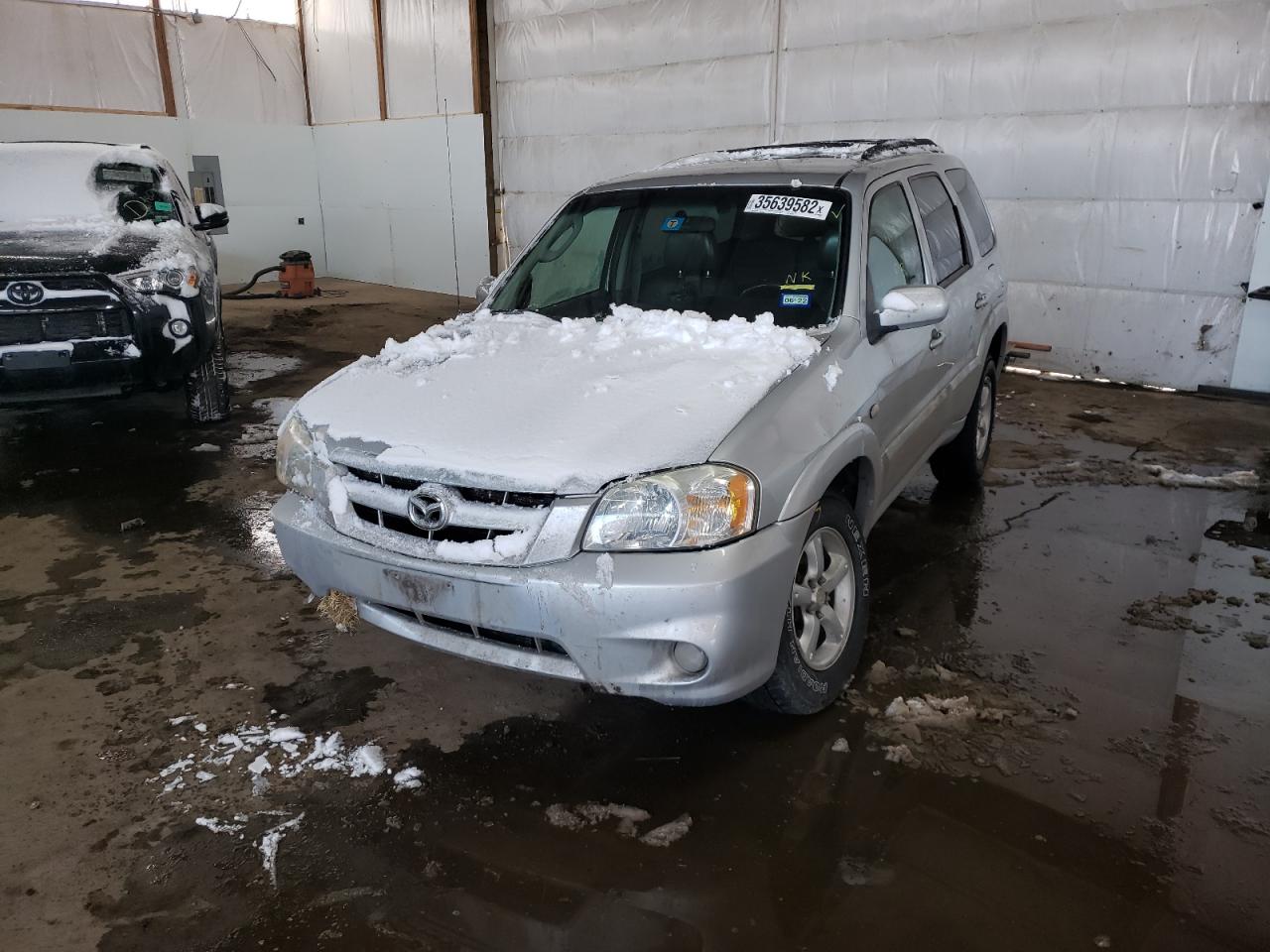 Photo 2 from auction – 2006 MAZDA TRIBUTE S with VIN 4F2CZ96116KM20712