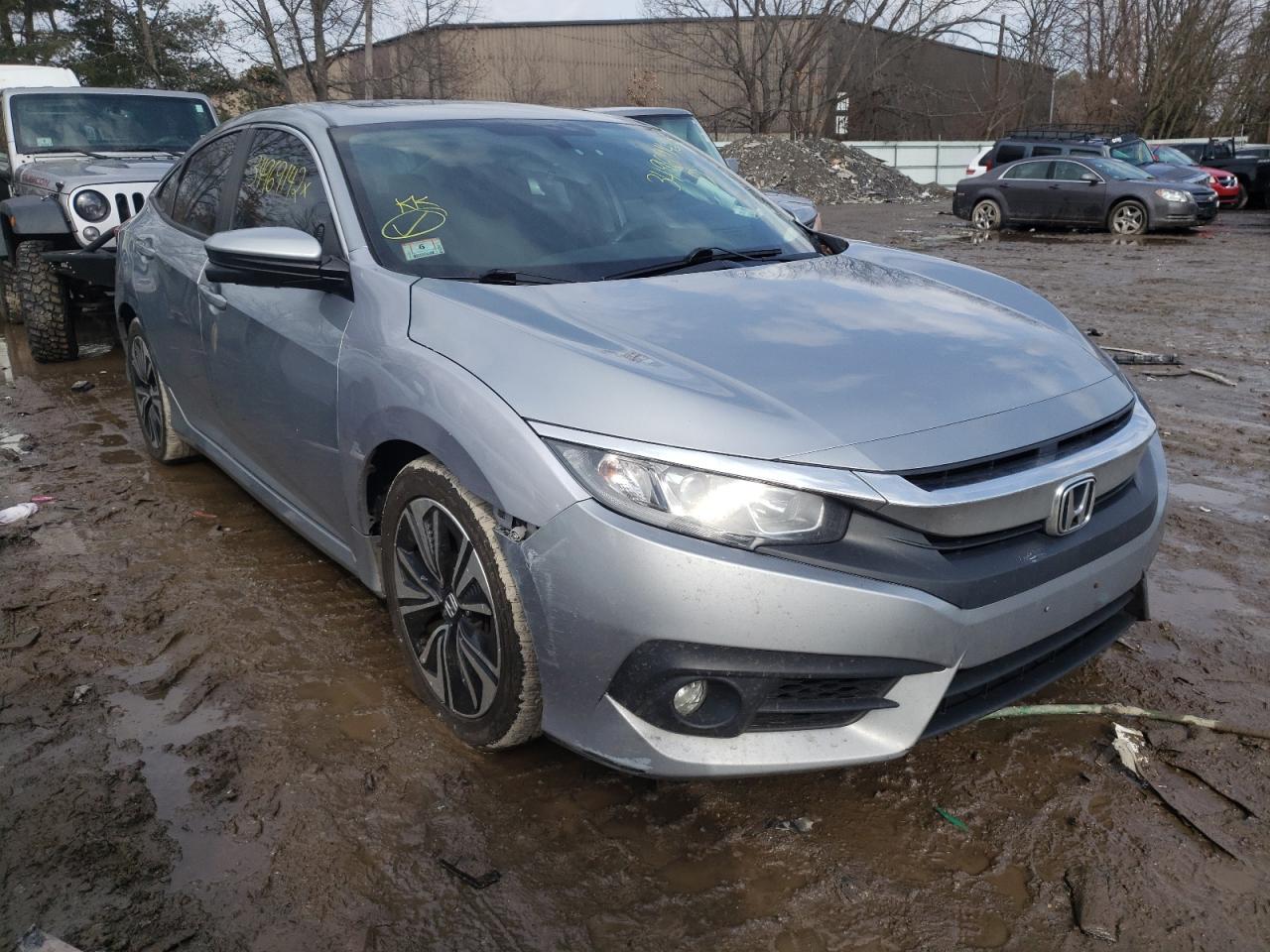 HONDA CIVIC EX 2016 with VIN 19XFC1F34GE218159 - Photo from auction