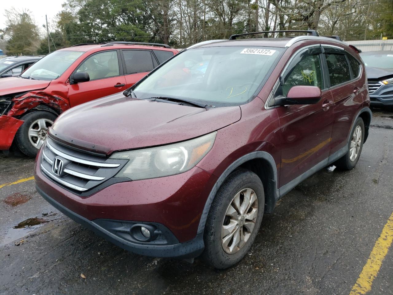 Photo 2 from auction – 2012 HONDA CR-V EXL with VIN 5J6RM3H71CL016817