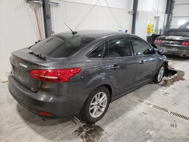 Photo 4 from auction – 2018 FORD FOCUS SE with VIN 1FADP3FE5JL330935