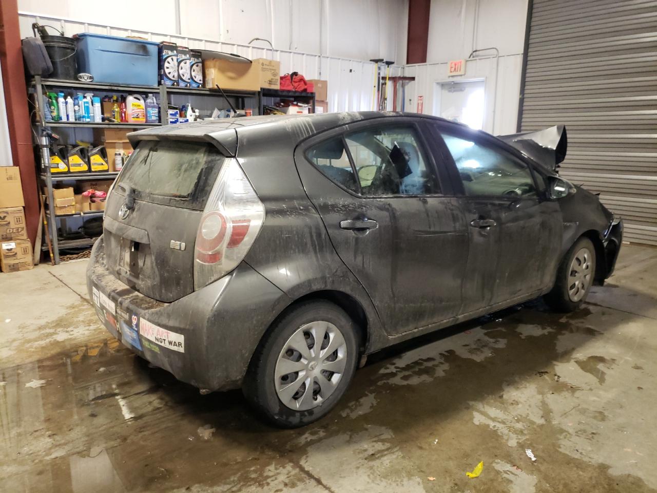 Photo 4 from auction – 2014 TOYOTA PRIUS C with VIN JTDKDTB31E1573495