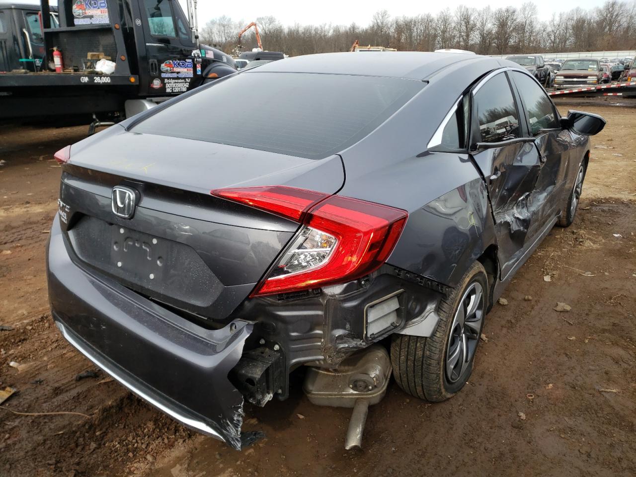 Photo 4 from auction – 2019 HONDA CIVIC LX with VIN 2HGFC2F66KH590696