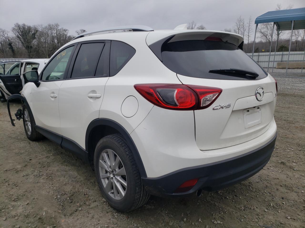 Photo 3 from auction – 2015 MAZDA CX-5 TOURI with VIN JM3KE2CY8F0474396