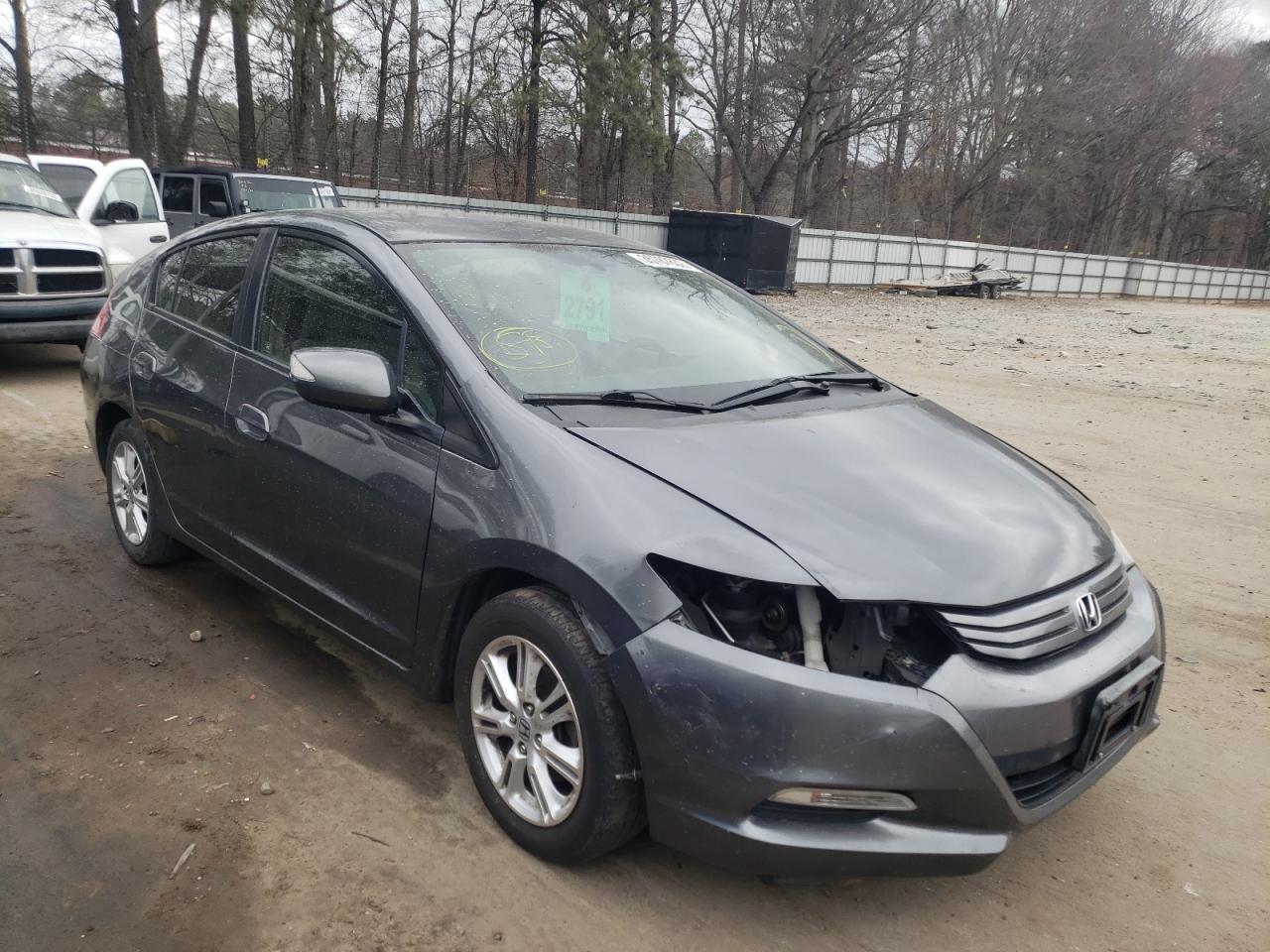 HONDA INSIGHT EX 2010 with VIN JHMZE2H78AS025903 - Photo from auction