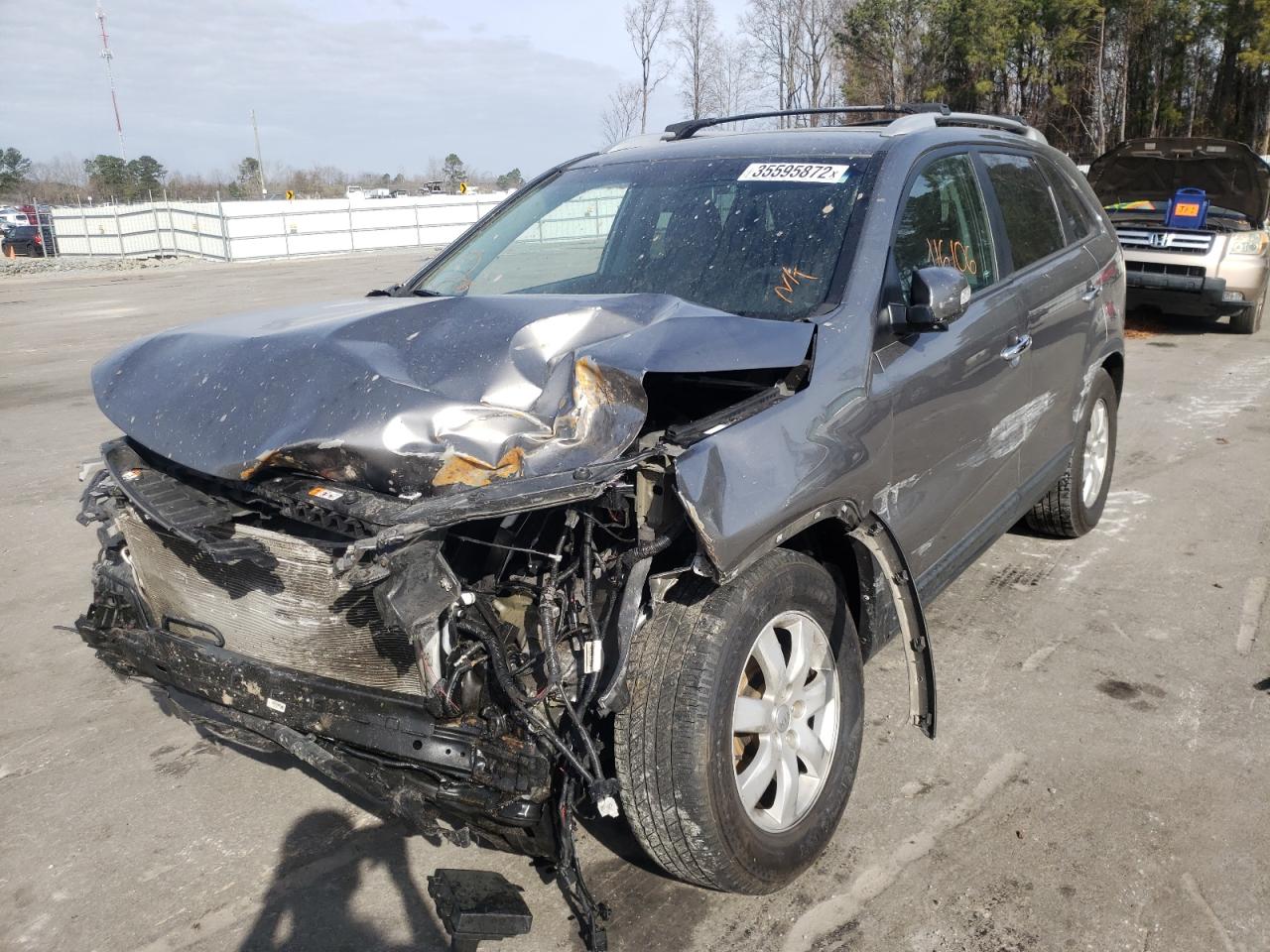 Photo 2 from auction – 2013 KIA SORENTO LX with VIN 5XYKT3A69DG424653