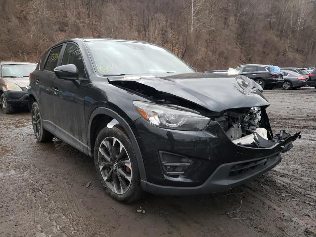 MAZDA CX-5 GT 2016 with VIN JM3KE4DY5G0706464 - Photo from auction