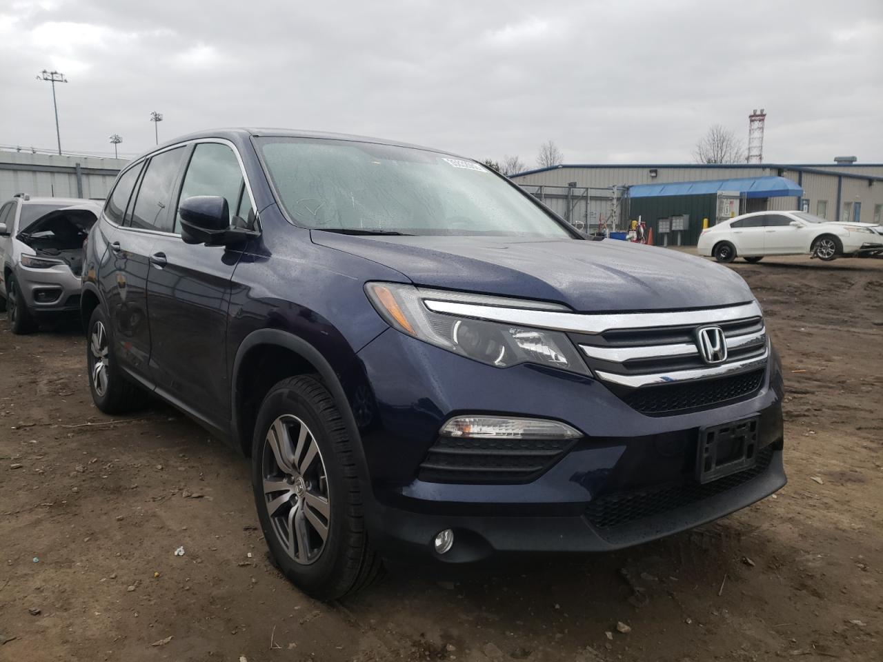 HONDA PILOT EXL 2017 with VIN 5FNYF6H58HB077765 - Photo from auction