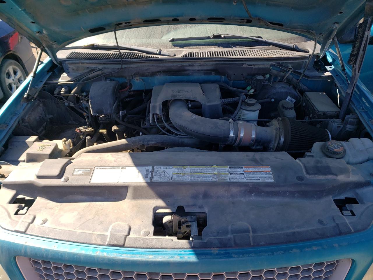 Photo 7 from auction – 1999 FORD F150 with VIN 1FTRX18L2XKA11510