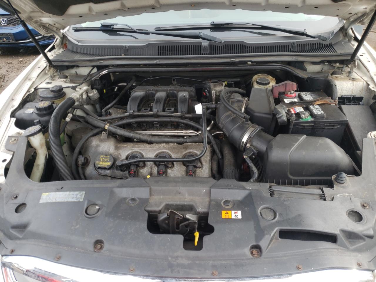 Photo 7 from auction – 2012 FORD TAURUS SEL with VIN 1FAHP2HW0CG118442
