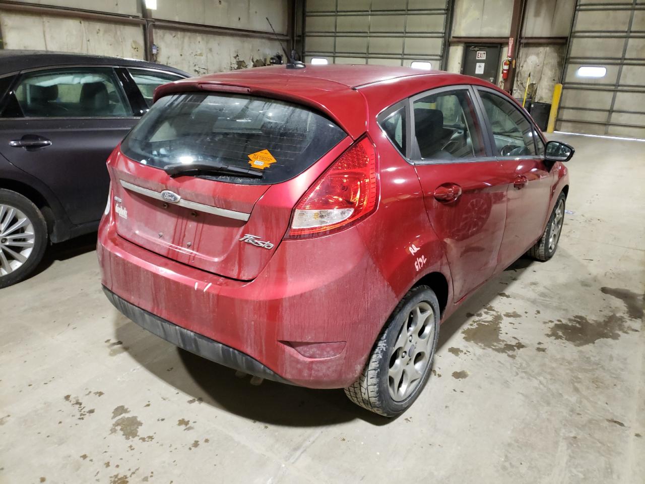 Photo 4 from auction – 2011 FORD FIESTA SES with VIN 3FADP4FJ9BM232588