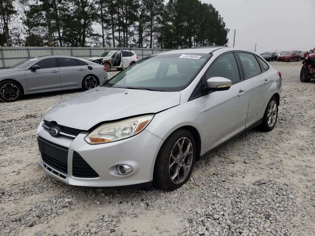 Photo 2 from auction – 2013 FORD FOCUS SE with VIN 1FADP3F23DL171441