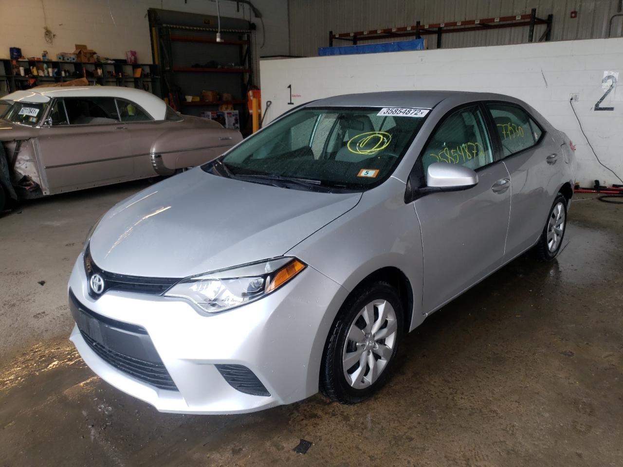Photo 2 from auction – 2014 TOYOTA COROLLA L with VIN 5YFBURHE7EP119212