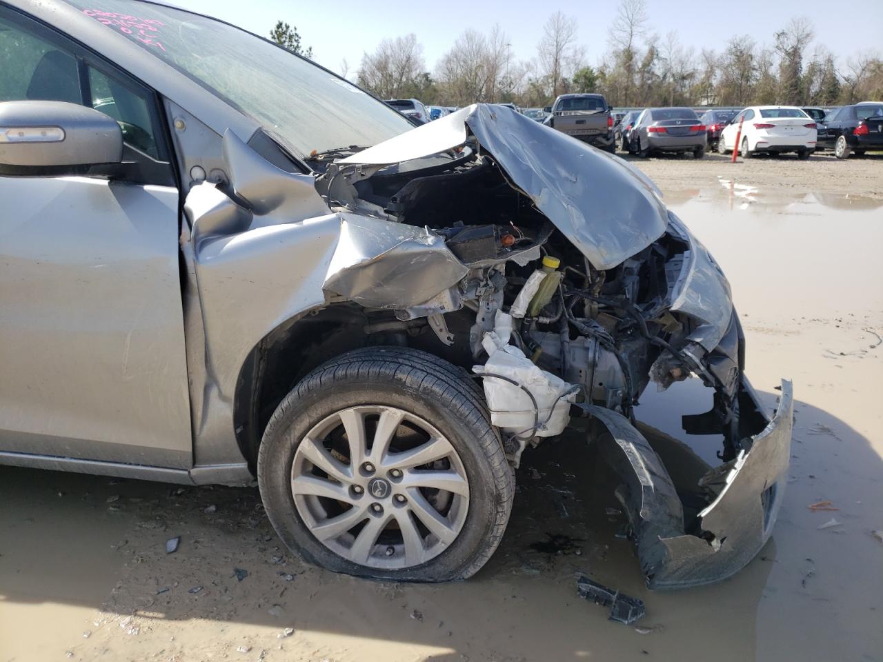 Photo 9 from auction – 2014 MAZDA 5 SPORT with VIN JM1CW2BL3E0166549