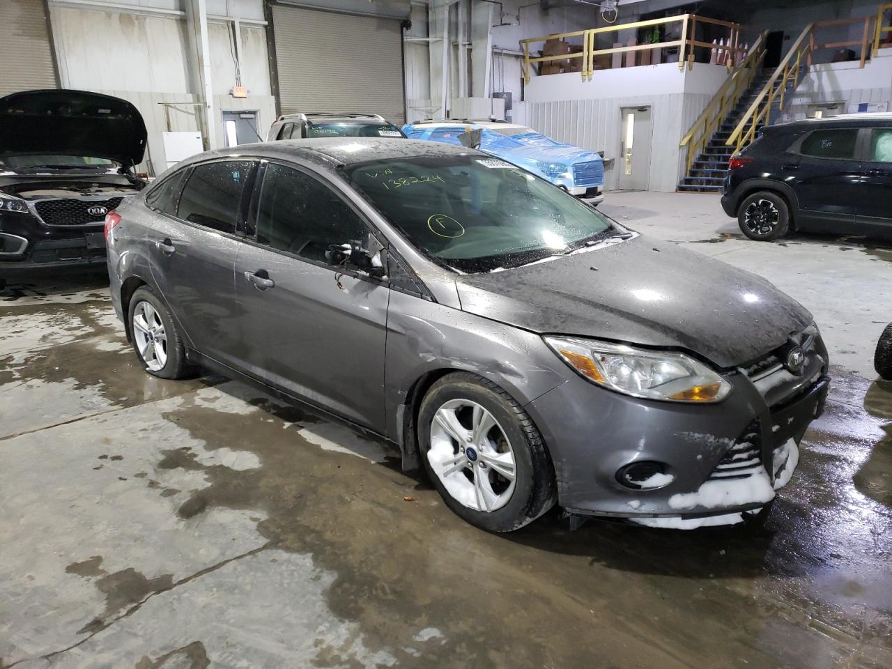 FORD FOCUS SE 2014 with VIN 1FADP3F24EL138224 - Photo from auction