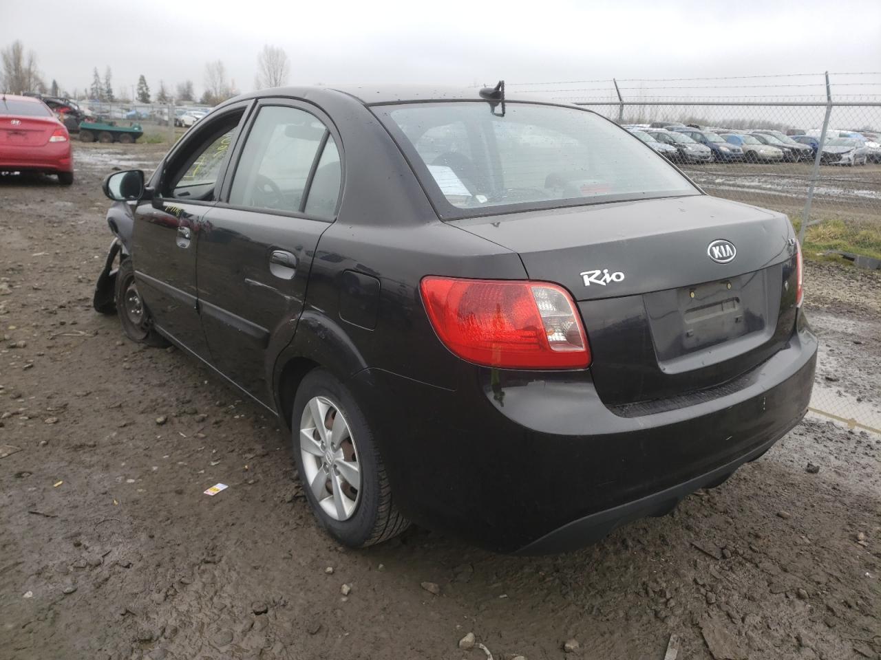 Photo 3 from auction – 2011 KIA RIO BASE with VIN KNADH4A3XB6939261
