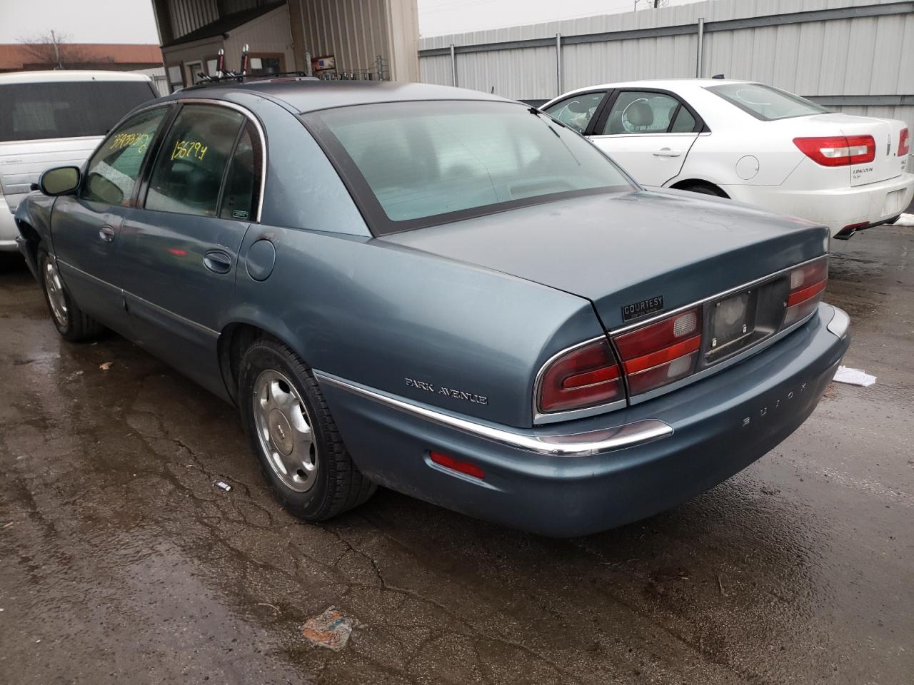 Photo 3 from auction – 2000 BUICK PARK AVENU with VIN 1G4CW54K7Y4286157