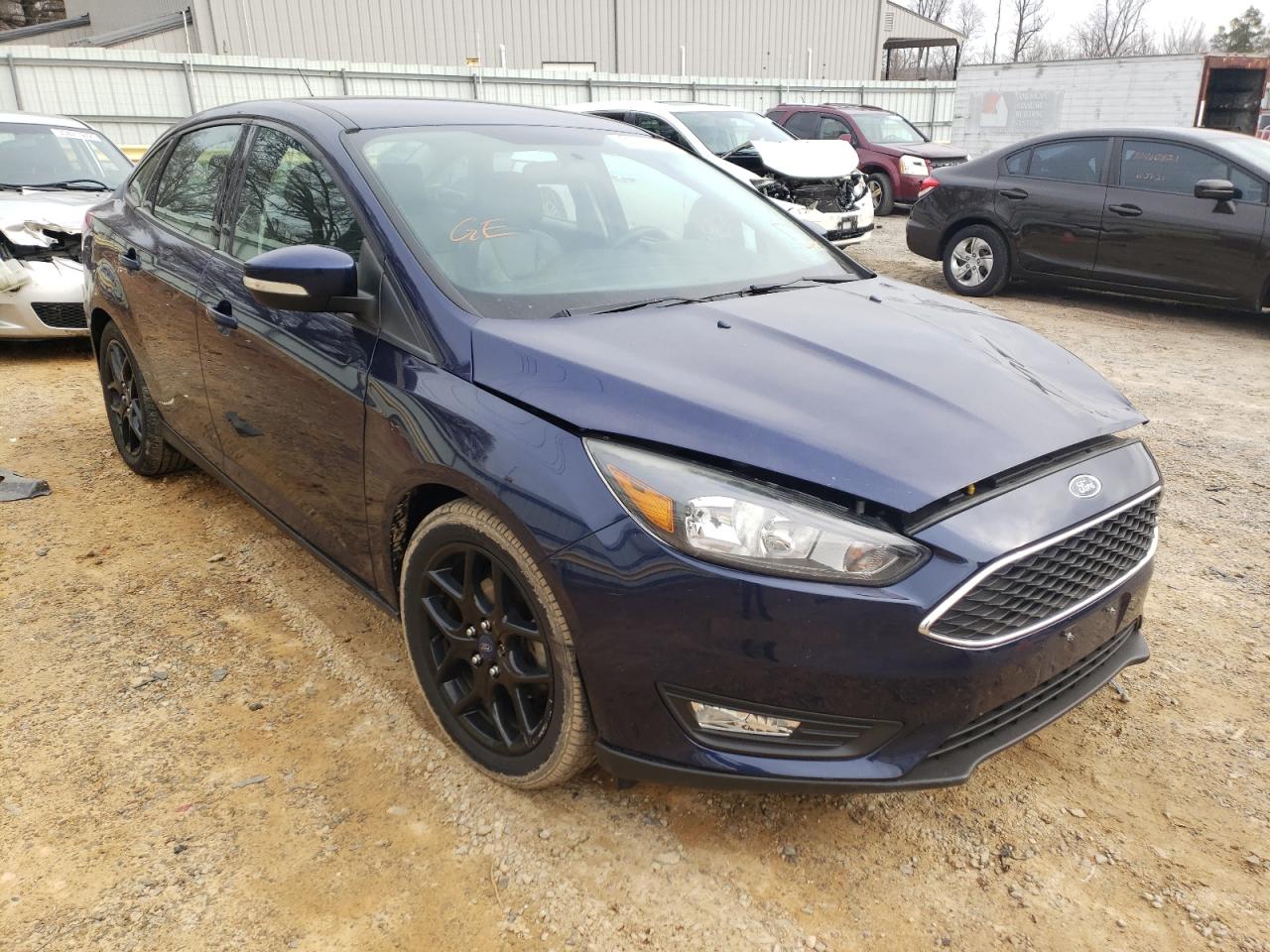 FORD FOCUS SE 2016 with VIN 1FADP3F23GL357422 - Photo from auction