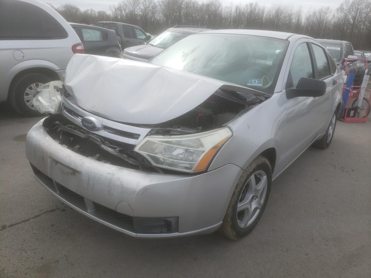 Photo 2 from auction – 2009 FORD FOCUS S with VIN 1FAHP34N69W211998