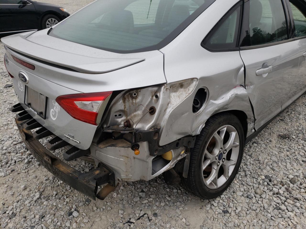 Photo 9 from auction – 2013 FORD FOCUS SE with VIN 1FADP3F23DL171441